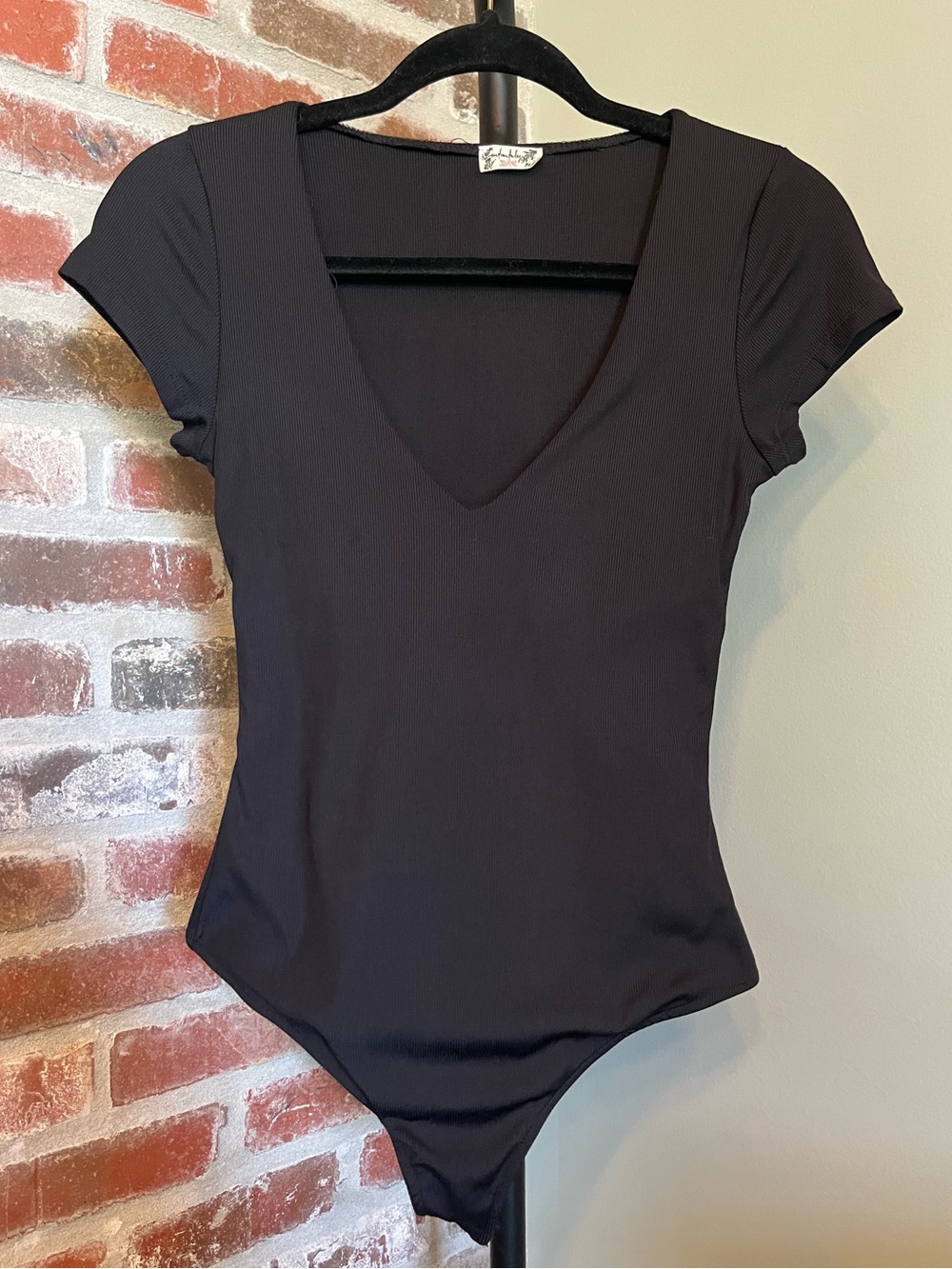 Free People Ready or Not Rib Bodysuit in black | size small